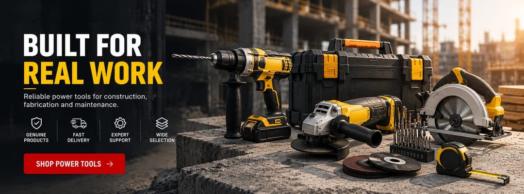Power tools supplied in Dubai — cordless hammer drill, angle grinder, circular saw, drill bit set and tool box on a construction site